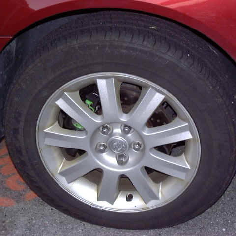 Close-up of Left Front Wheel, Showing EBC Rotor and Greenstuff Pad
