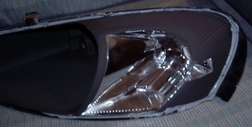 Left-Hand Headlamp Frame, Showing Chromed Running Lamp Cavity
