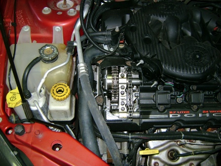 Backfire-induced Valve Cover Damage
